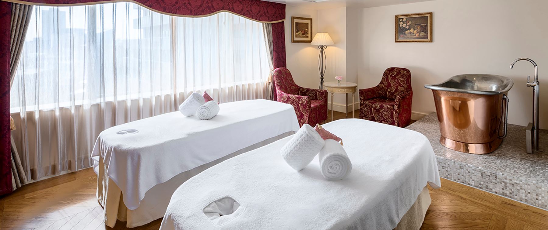 woman with hot rocks on her back