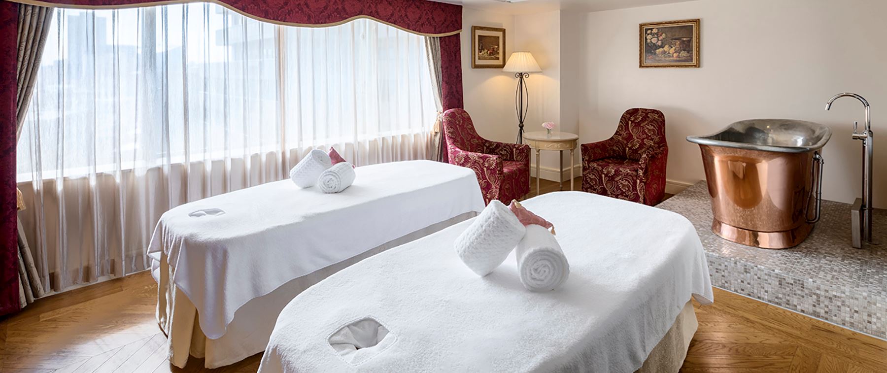 woman with hot rocks on her back