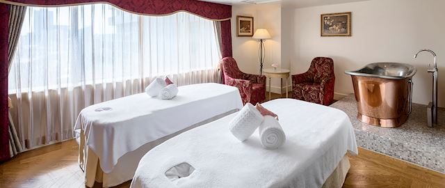 woman with hot rocks on her back